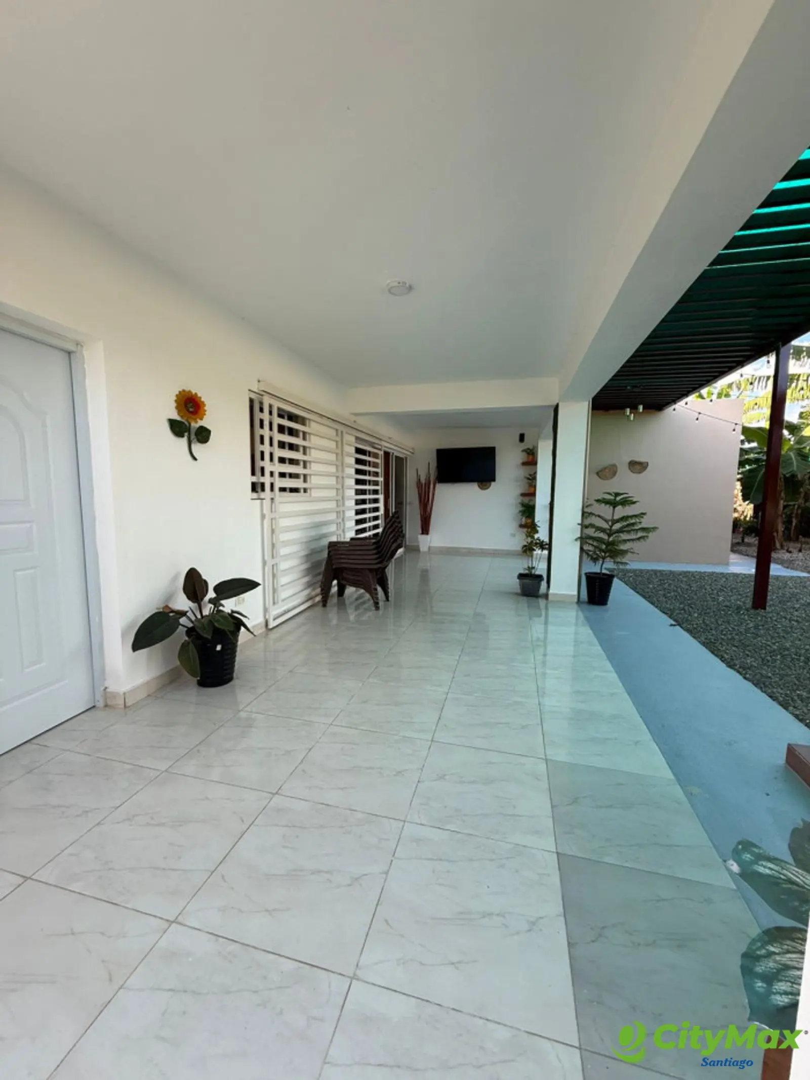 VENTA DE CASA CON PATIO Y PICUZZI EN SANTIAGO - foto 7