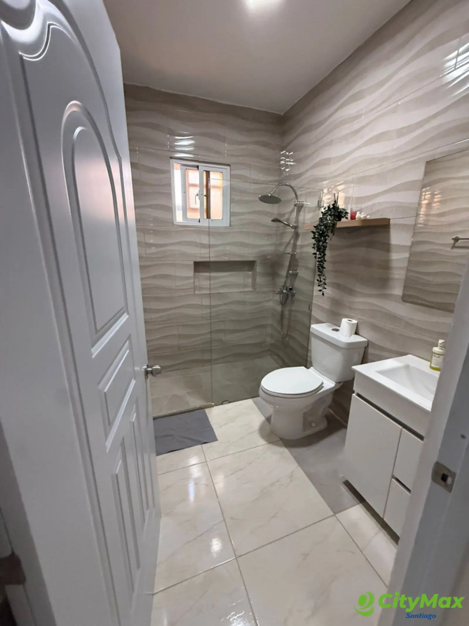 VENTA DE CASA CON PATIO Y PICUZZI EN SANTIAGO - foto 15